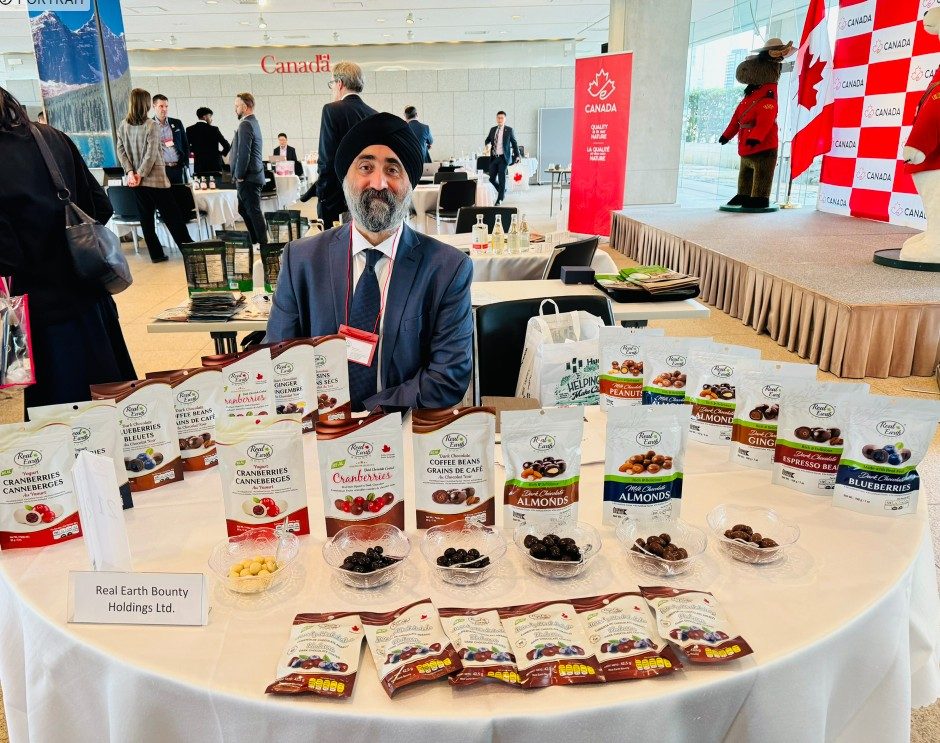 Manny Singh with Real Earth Bounty products at the Canadian Embassy in Japan